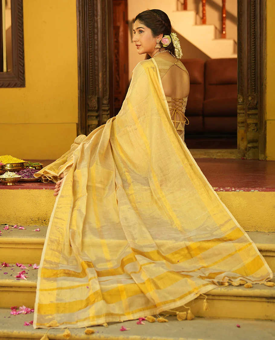 Gleaming Gold Khadi Tissue Saree, Elevated with Zari Stripes All Over Its Body, Highlighted by Zari Bavanji Border, Zari Striped Pallu, and Paired with a Matching Blouse - Image 5