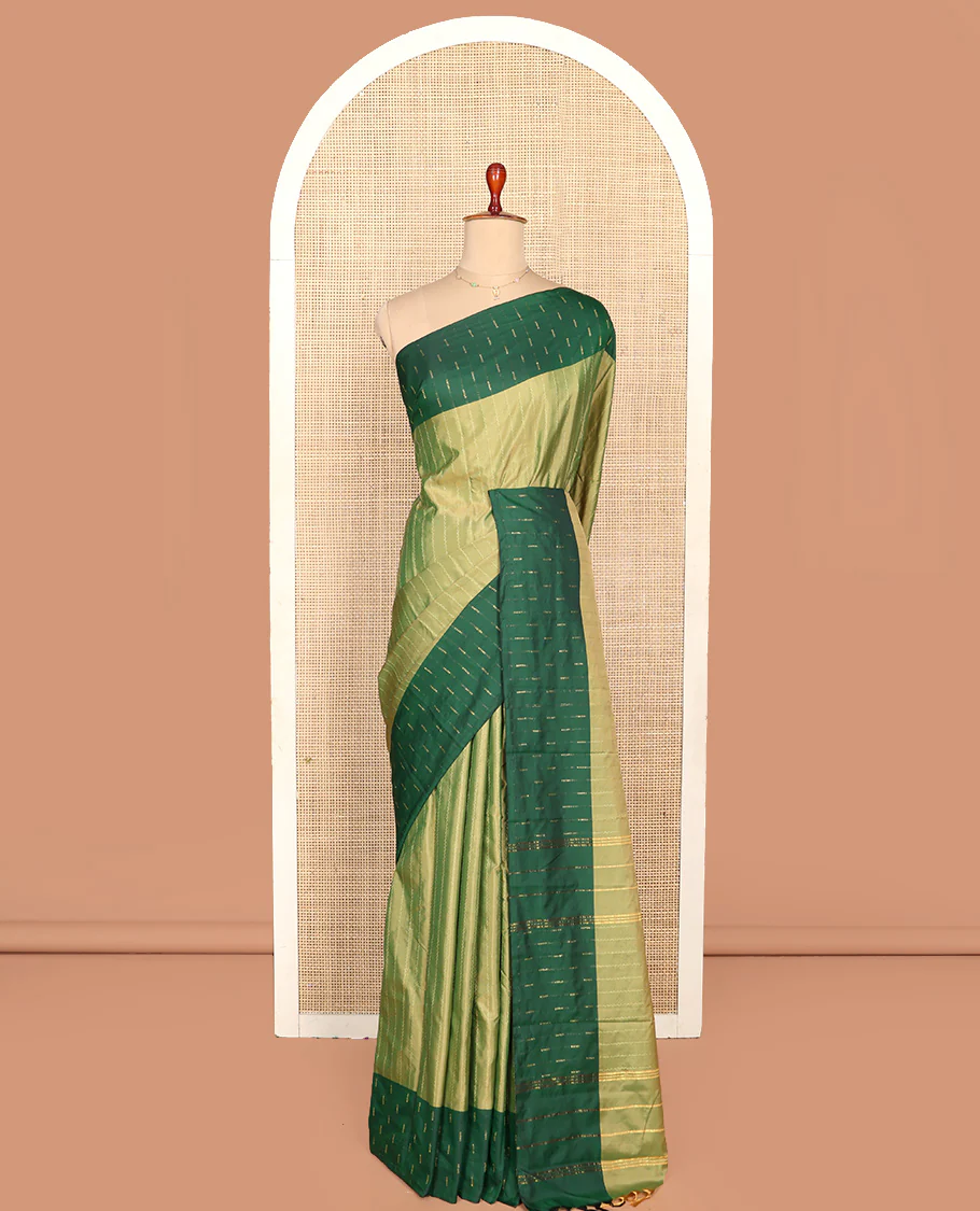 Green Aarani Silk Saree, Lightly Embellished with Zig-Zag Stripes All Over Its Body, Complemented by a Contrast Zari Buttas Border, Pallu of Stripes, and Paired with a Matching Blouse - Image 3