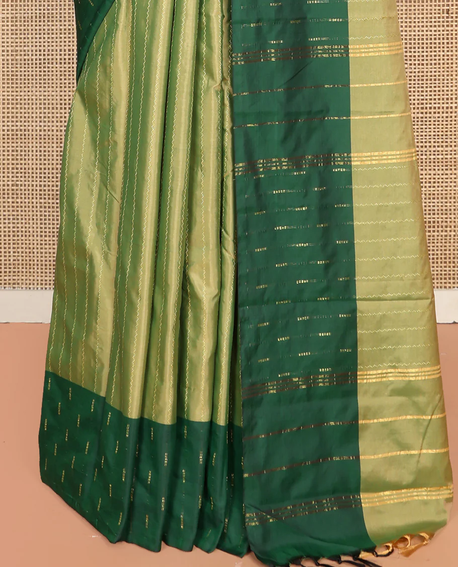 Green Aarani Silk Saree, Lightly Embellished with Zig-Zag Stripes All Over Its Body, Complemented by a Contrast Zari Buttas Border, Pallu of Stripes, and Paired with a Matching Blouse - Image 4