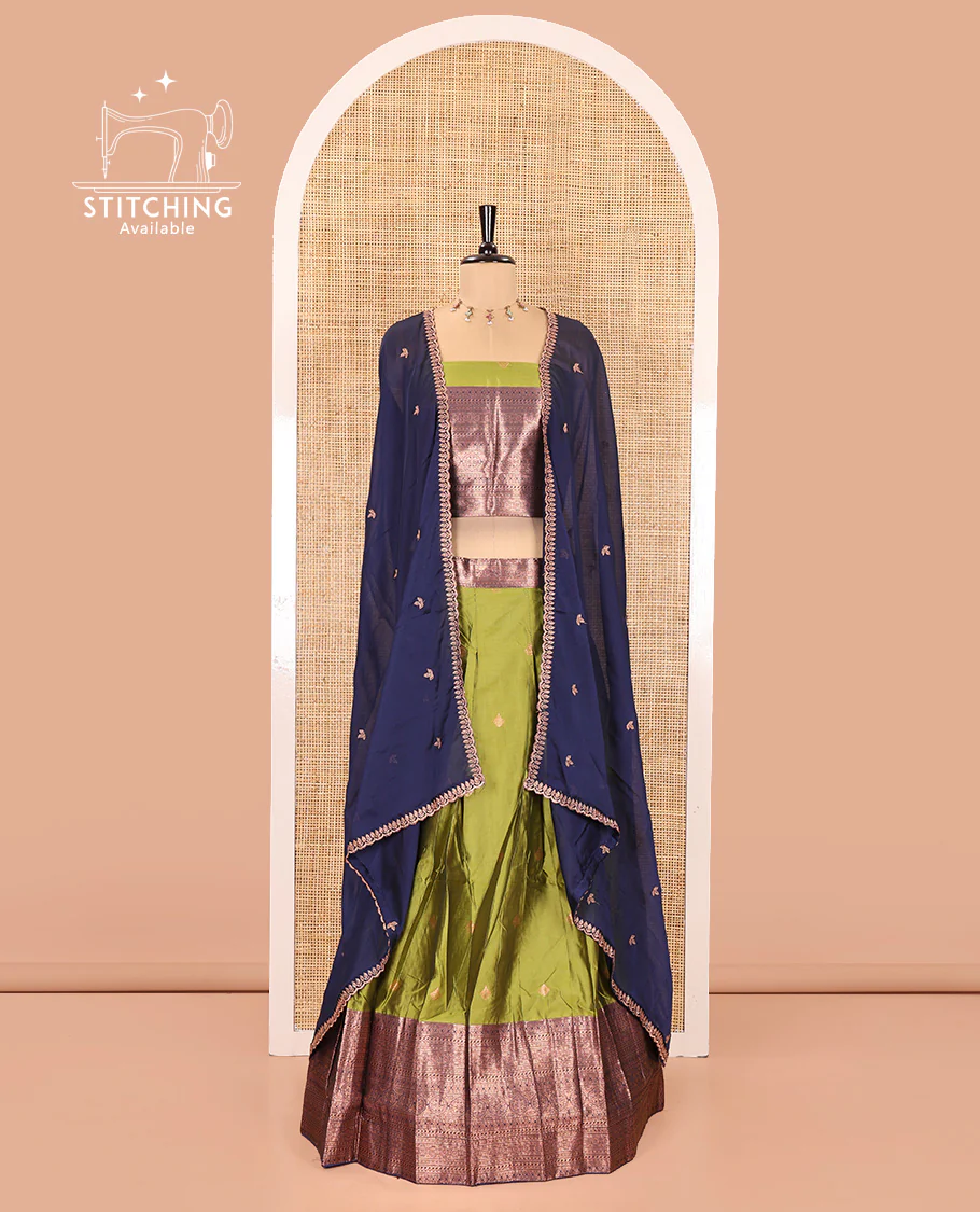 Green and Navy Blue Semi-Banarasi Half-Saree, Ornamented with Zari Buttas on Its Skirt, Complemented by a Contrast Traditional Zari Designs Woven Border, Paired with a Matching Blouse, and a Contrast Satin Georgette Embroidered Scallop Dhavani - Image 2