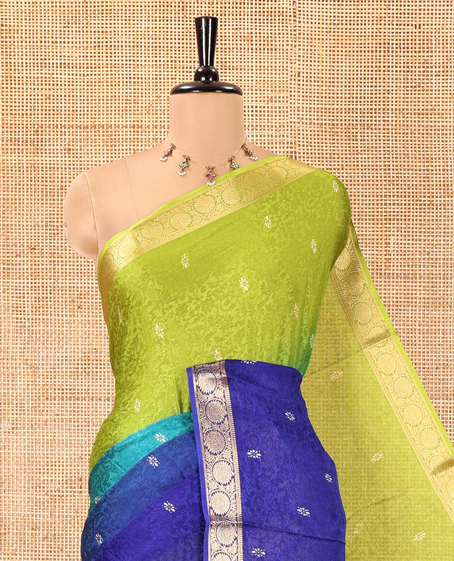Green and Royal Blue Candy Chiffon Saree, Featuring Floral Vine Embossed, Buttas, and Ombre-Style Dyed on Its Body, Highlighted by Floral Creeper Zari Border, Intricately Designed Pallu, and Paired with a Contrast Blouse - Image 2