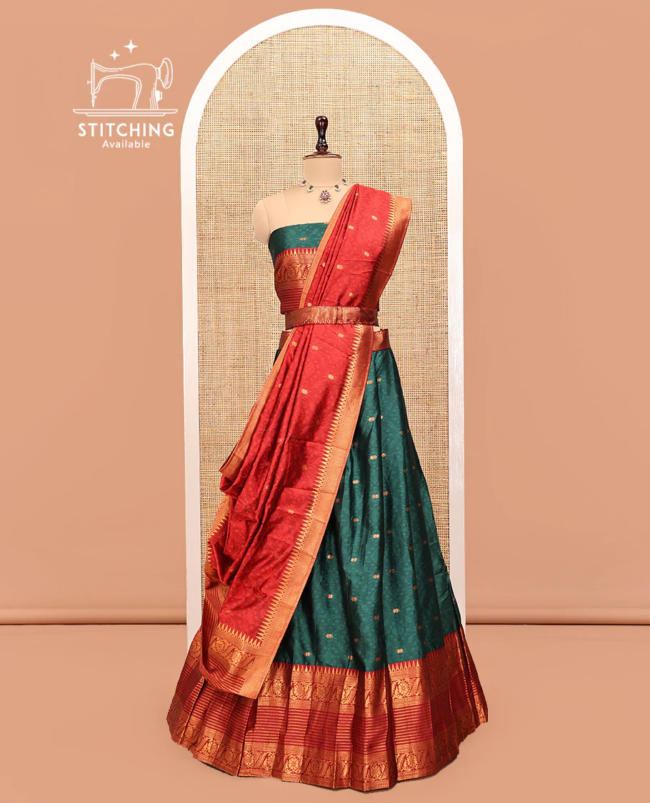 Green Art Silk Half Saree, Delicately Woven with Embossed and Buttas Skirt, Contrast Traditional Border, Matching Blouse, and a Contrast Dhavani