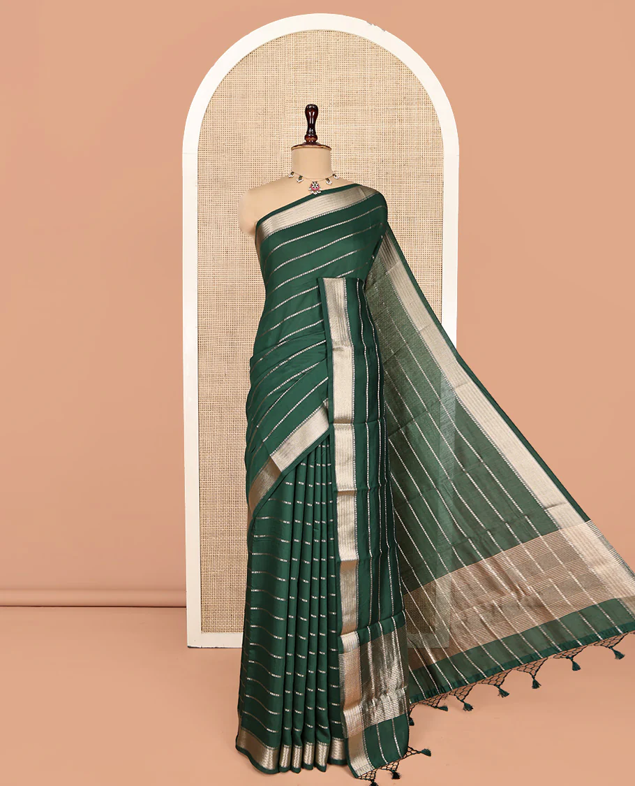 Green Assam Silk Saree, Embellished with Zari Stripes, a Traditional Zari Border, a Pallu Steeped with Zari Stripes