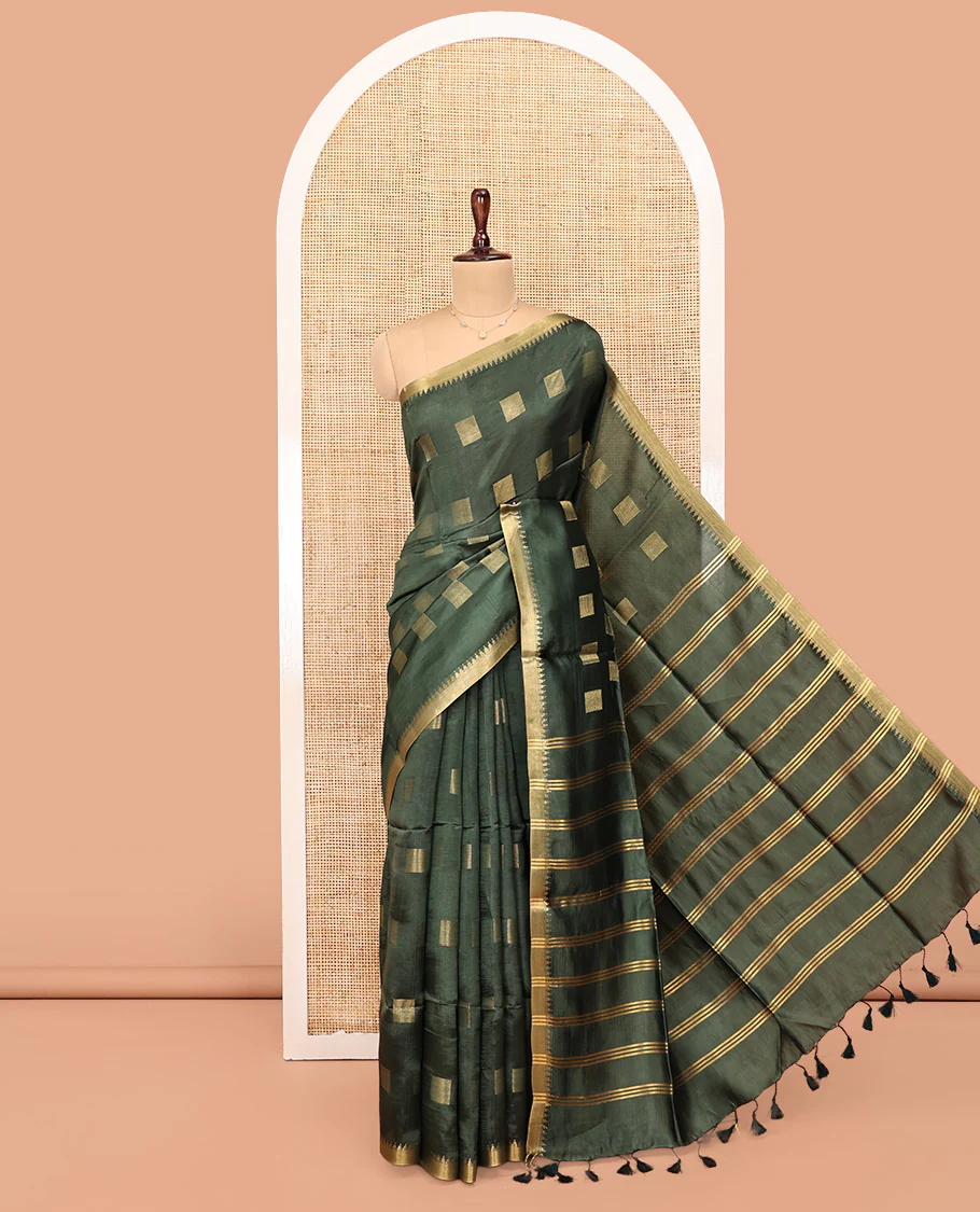 Green Banana Pith Saree, Sparsely Sparkled with Square Buttas All Over Its Body, Highlighted by a Zari Temple Border, Gleaming Zari Striped Pallu, and Paired with a Matching Blouse