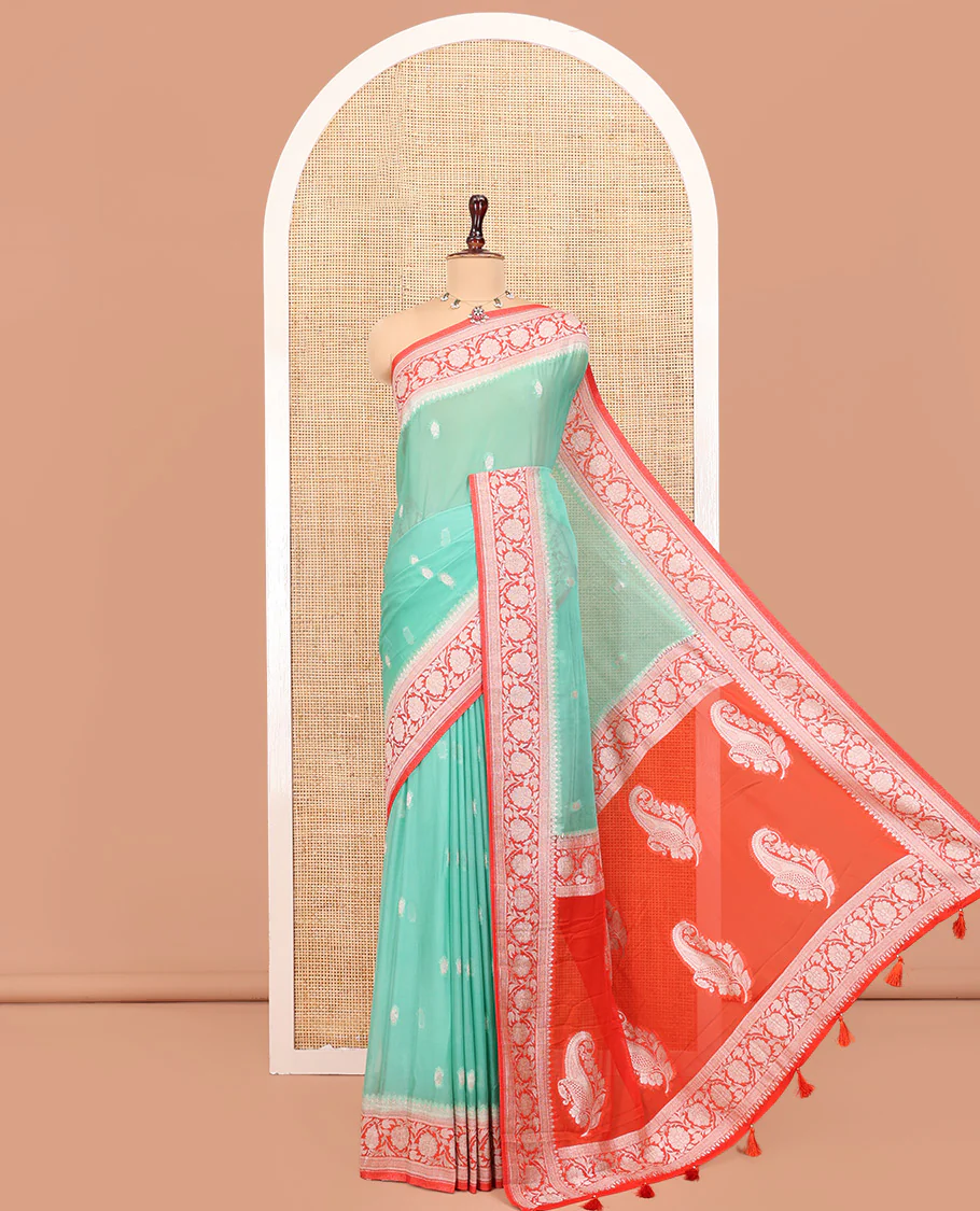 Green Banarasi Georgette Saree, Adorned with Zari Buttas All Over Its Body, Complemented by a Contrast Floral Creeper Design Border, Pallu of Paisleys, and Paired with a Contrast Blouse