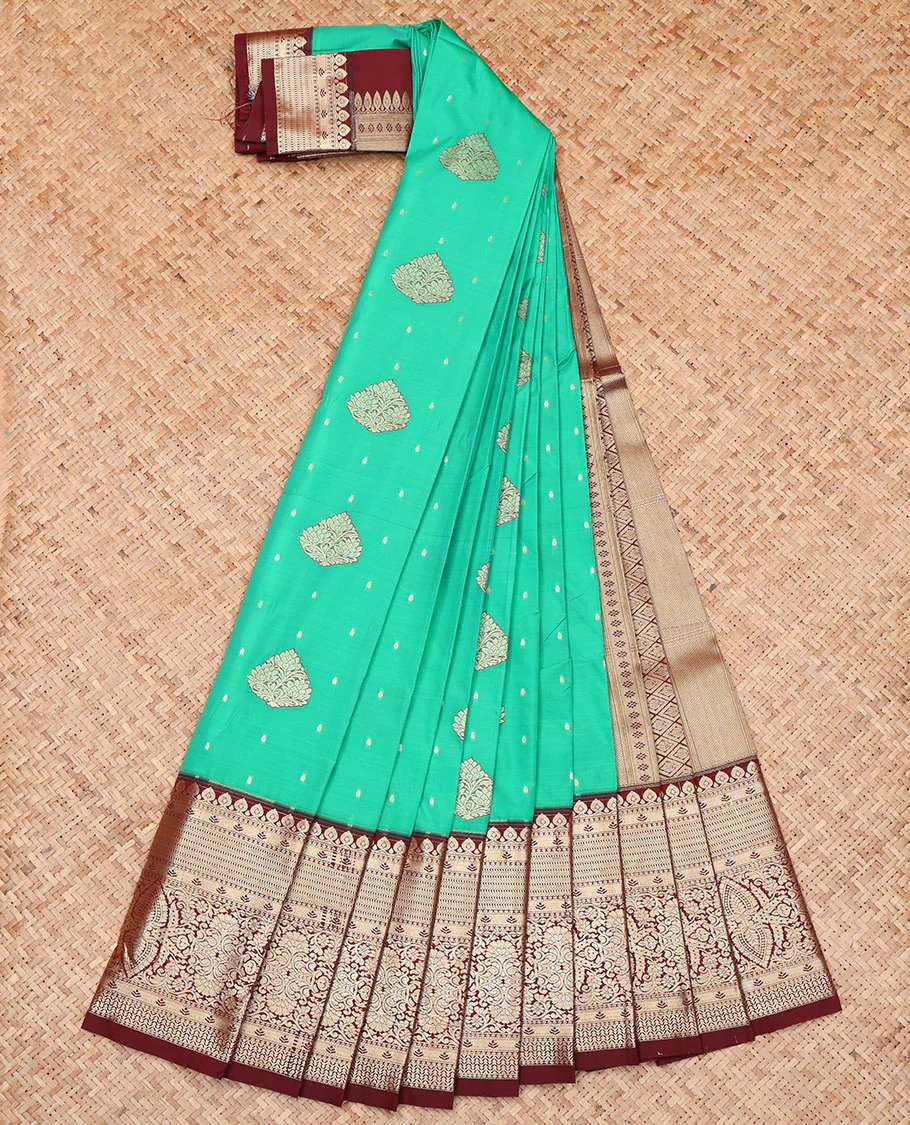 Green Budget Silk Saree, Accentuated with Zari Buttas on Its Body, Complemented by a Contrast Traditional Zari Design-Woven Border, Geometric Patterned Pallu, and Paired with a Contrast Blouse - Image 2