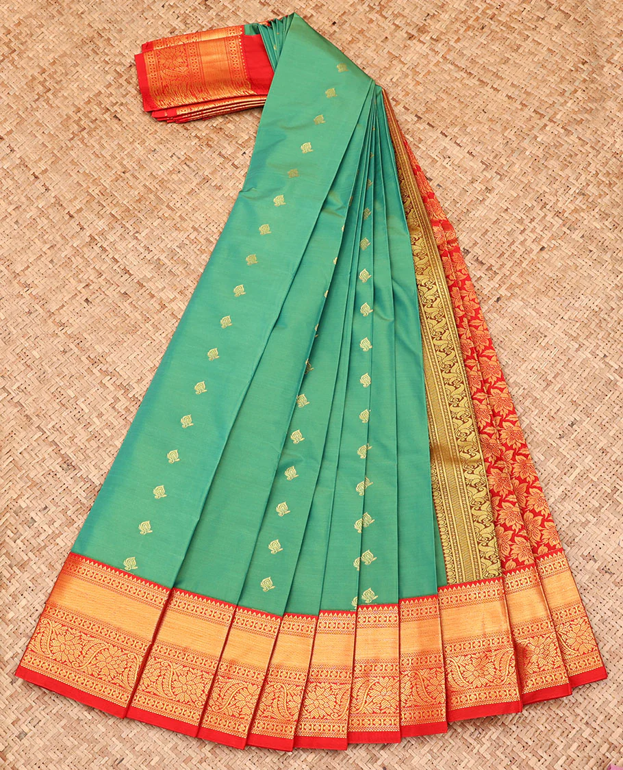 Green Budget Silk Saree, Artfully Detailed with Zari Buttas All Over Its Body, Complemented by a Contrast Traditional Zari Design Border, Pallu of Floral Designs, and Paired with a Contrast Blouse - Image 2