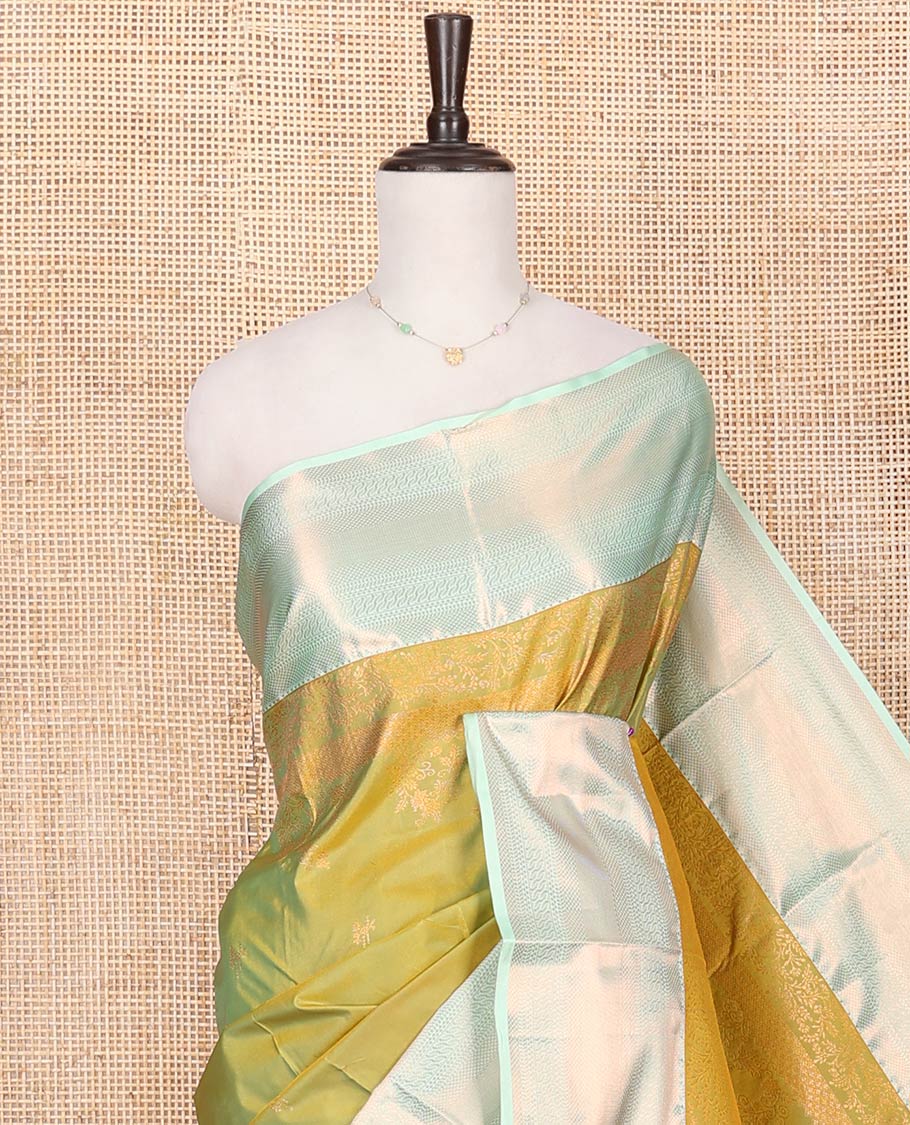 Green Budget Silk Saree, Decked Up with Zari Buttas All Over Its Body, Complemented by a Contrast Traditional Zari Design Border, Intricately Zari Designed Pallu, and Paired with a Contrast Blouse - Image 2