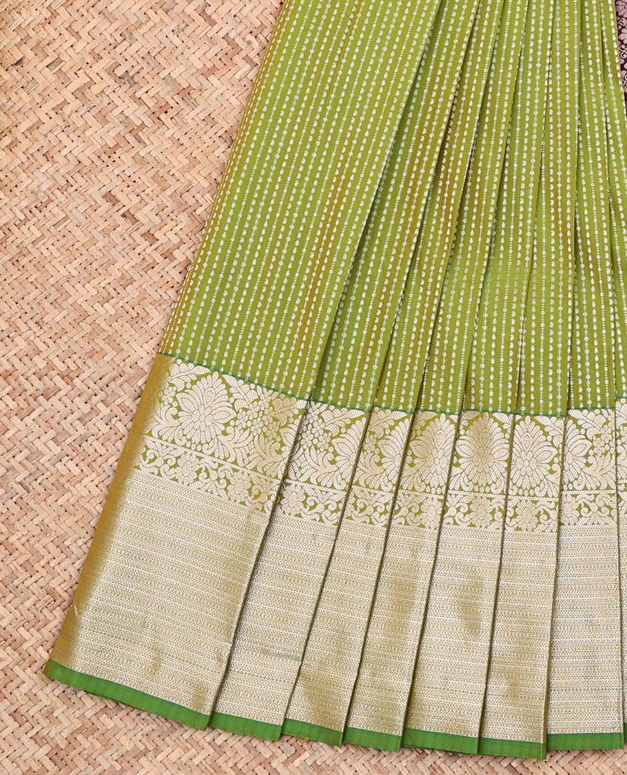 Green Budget Silk Saree, Entralled with Zari Stripes On Its Body, Highlighted by Traditional Zari Designs Woven Border, Grandly Decked Up Pallu and Paired with a Contrast Blouse