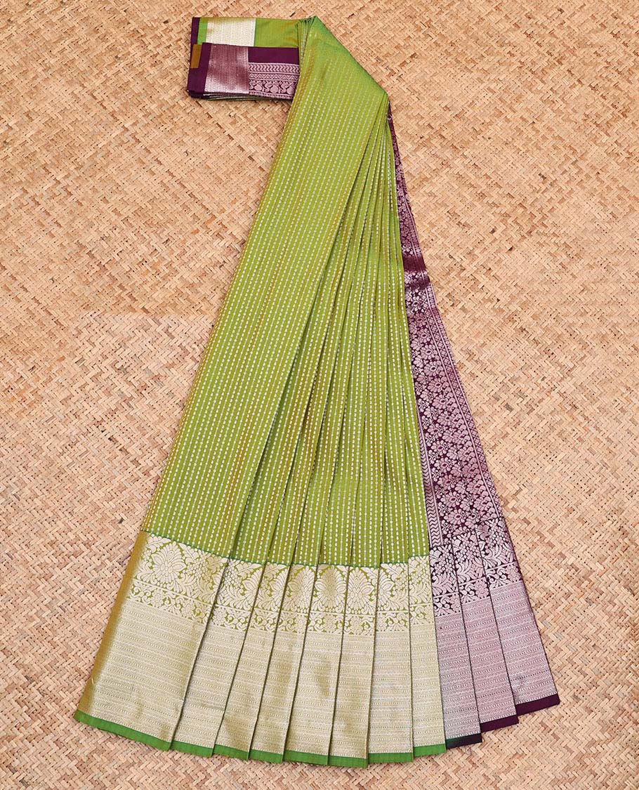 Green Budget Silk Saree, Entralled with Zari Stripes On Its Body, Highlighted by Traditional Zari Designs Woven Border, Grandly Decked Up Pallu and Paired with a Contrast Blouse - Image 2