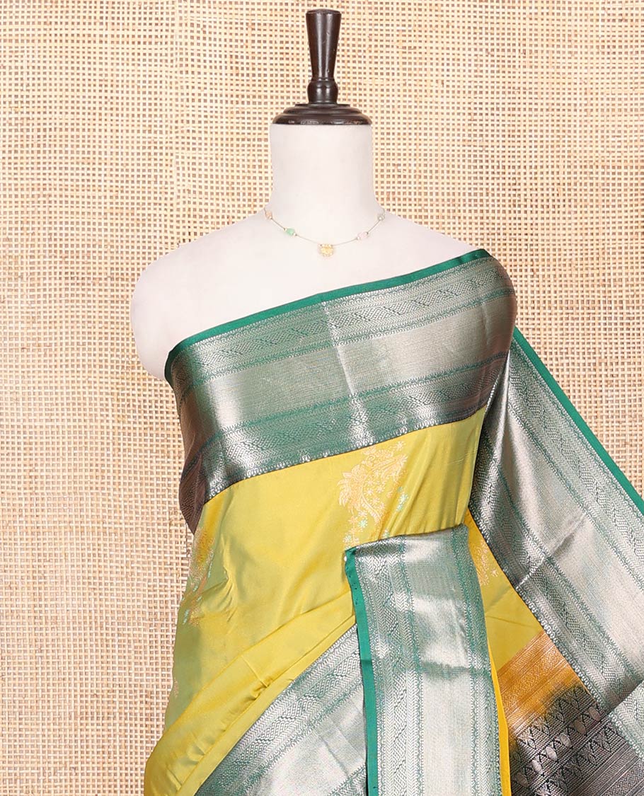 Green Budget Silk Saree, Gracefully Embellished with Zari Buttas All Over Its Body, Complemented by a Contrast Traditional Zari Design Border, Chevron Striped Pallu, and Paired with a Contrast Blouse - Image 2