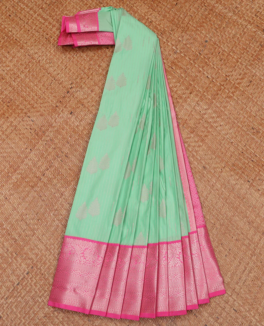 Green Budget Silk Saree Sparsely Sparkled with Tree Buttas and Stripes All Over Its Body, Complemented by a Contrast Border of Traditional Zari Designs, Pallu Gleamed Up with Jaal Designs, and Paired with a Contrast Blouse - Image 2