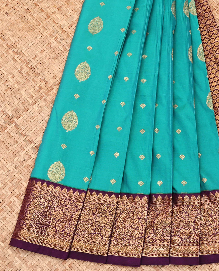 Green Budget Silk Saree, Woven with Zari Buttas All Over Its Body, Complemented by a Contrast Traditional Zari Design Border, Grand Pallu, and Paired with a Contrast Blouse