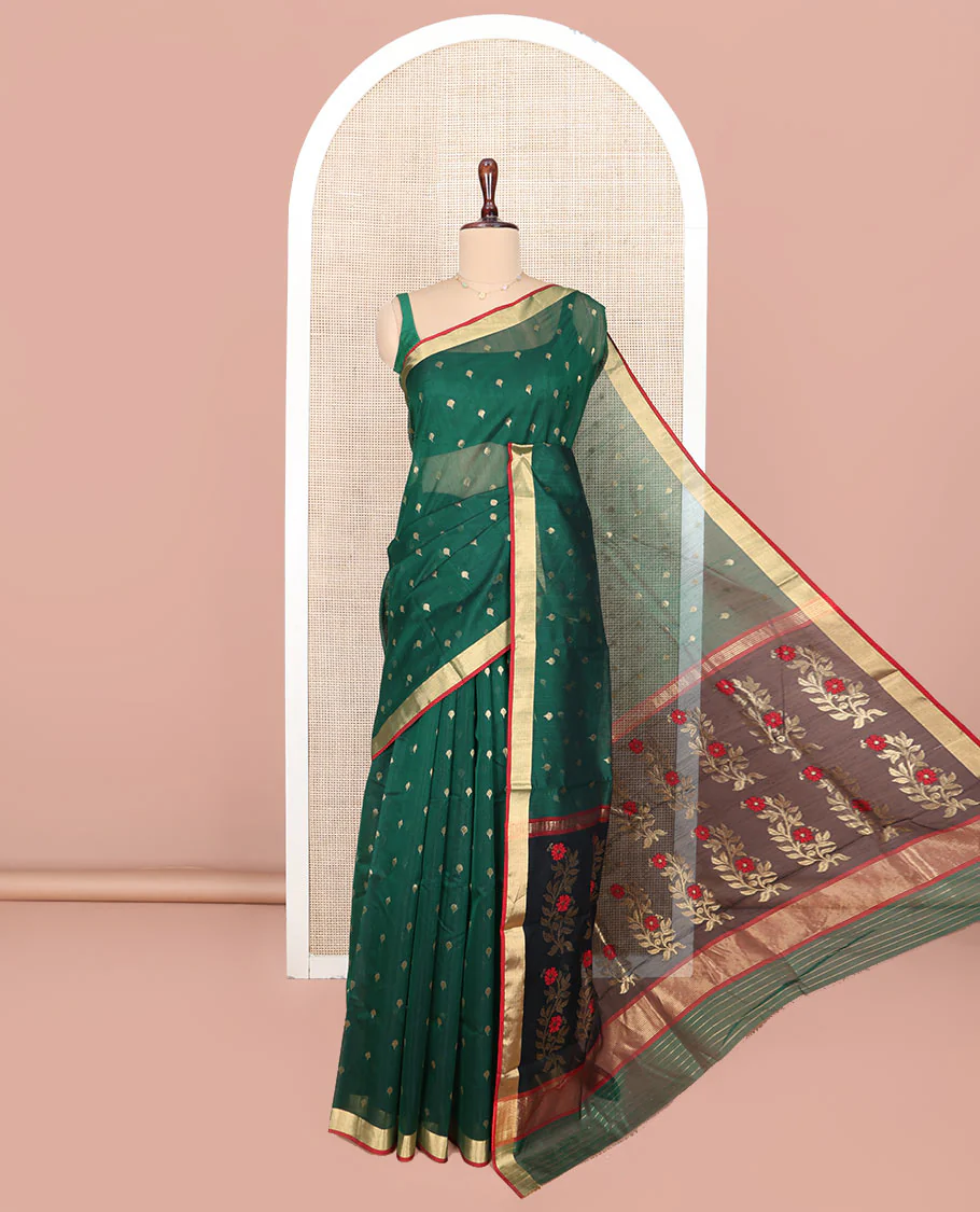 Green Chanderi Cotton Saree, Spotlighted with Zari Buttas All Over Its Body, Highlighted by Zari Border, Pallu of Floral Buttas, and Paired with a Contrast Blouse