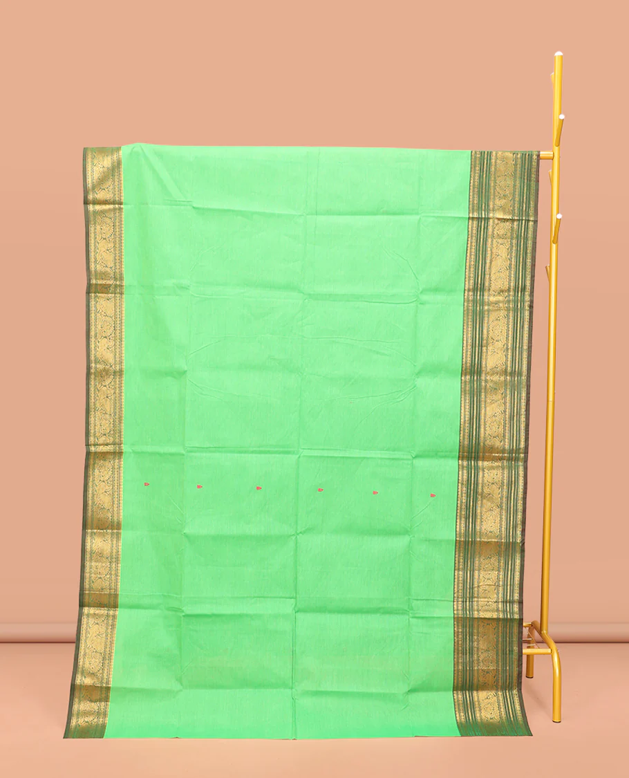 Green Chettinad Cotton Saree, Detailed with Buttas All Over Its Body, Complemented by a Contrast Traditional Zari Design Border, Pallu of Stripes and Buttas, and Paired with a Matching Blouse
