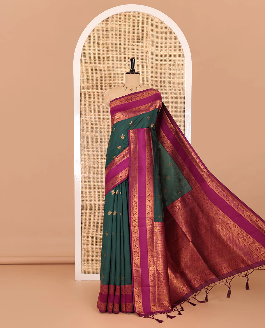 Green copper zari buttas elite soft silk saree , contrast zari weaving border , contrast brocade rich pallu with tussels , and contrast brocade blouse