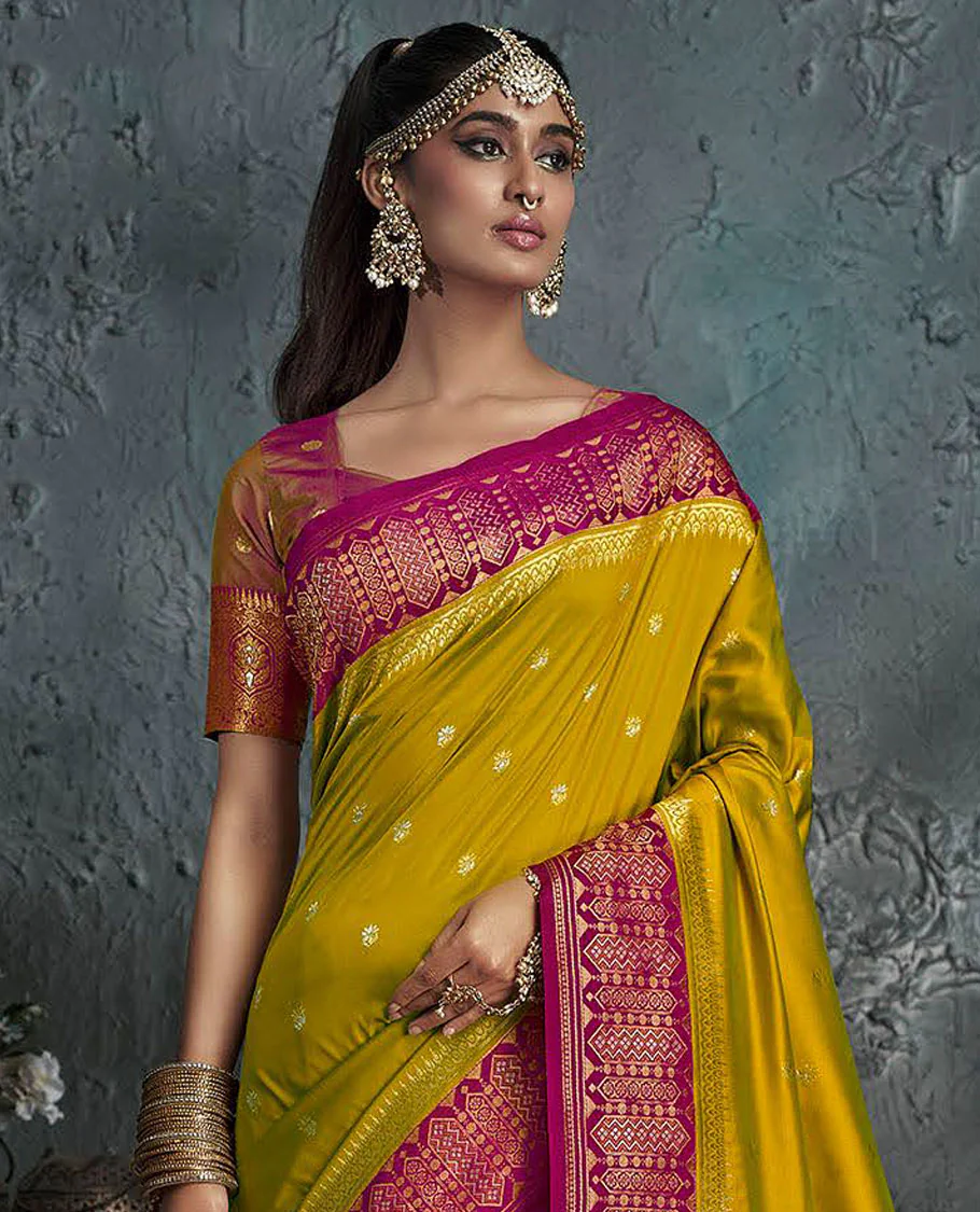Green Designer Saree, Adorned with Buttas on Its Body, Complemented by a Contrast Border of Geometric Designs, Pallu Depicts Ogee Patterns, and Paired with a Contrast Blouse - Image 2