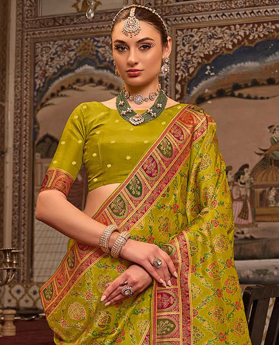 Green Designer Saree, Embellished with Meenakari-Style Floral-Jaal Design All Over Its Body, Complemented by a Contrast Mughal-Style Border, Meticulously Meenakari Designs Crafted Pallu, and Paired with a Contrast Blouse - Image 2