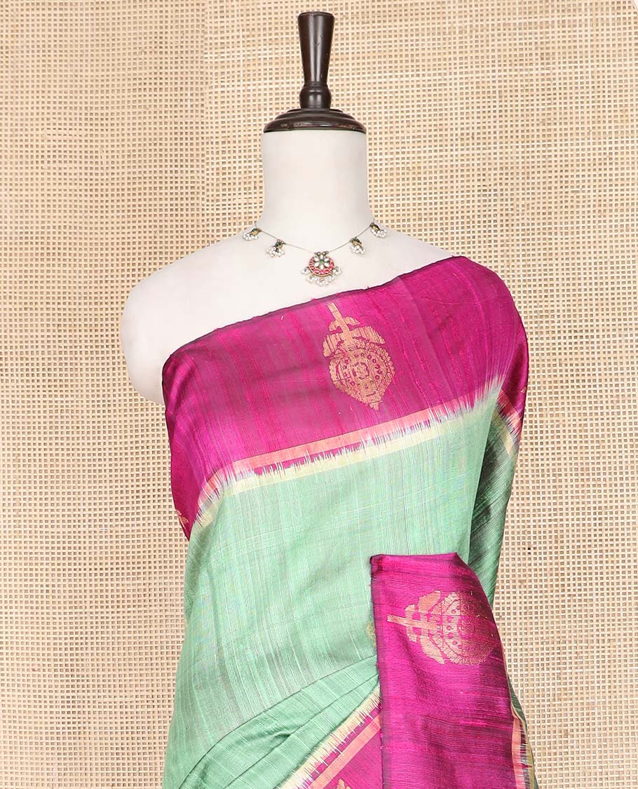 Green Dupion Silk Saree, Charmingly Accented with Buttas on Its Body, Complemented by a Contrast Border of Floral-Style Motifs, Intricately Designed Pallu, and Paired with a Contrast Blouse - Image 2
