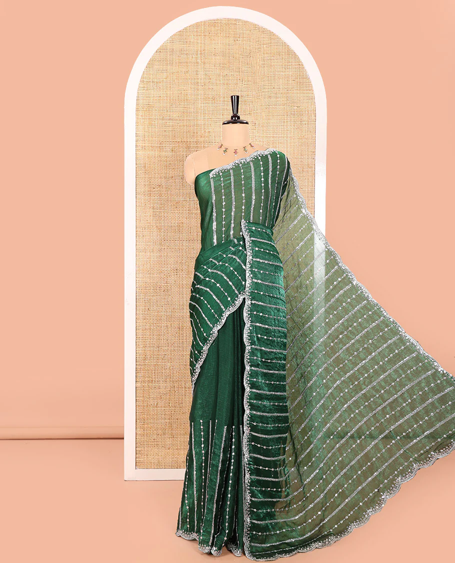 Green Fendy Chiffon Saree Highlighted with Sequins and Thread Stripes Embroidery, Scallop Embroidered Border, Elegantly Embroidered Pallu, and Paired with a Matching Blouse