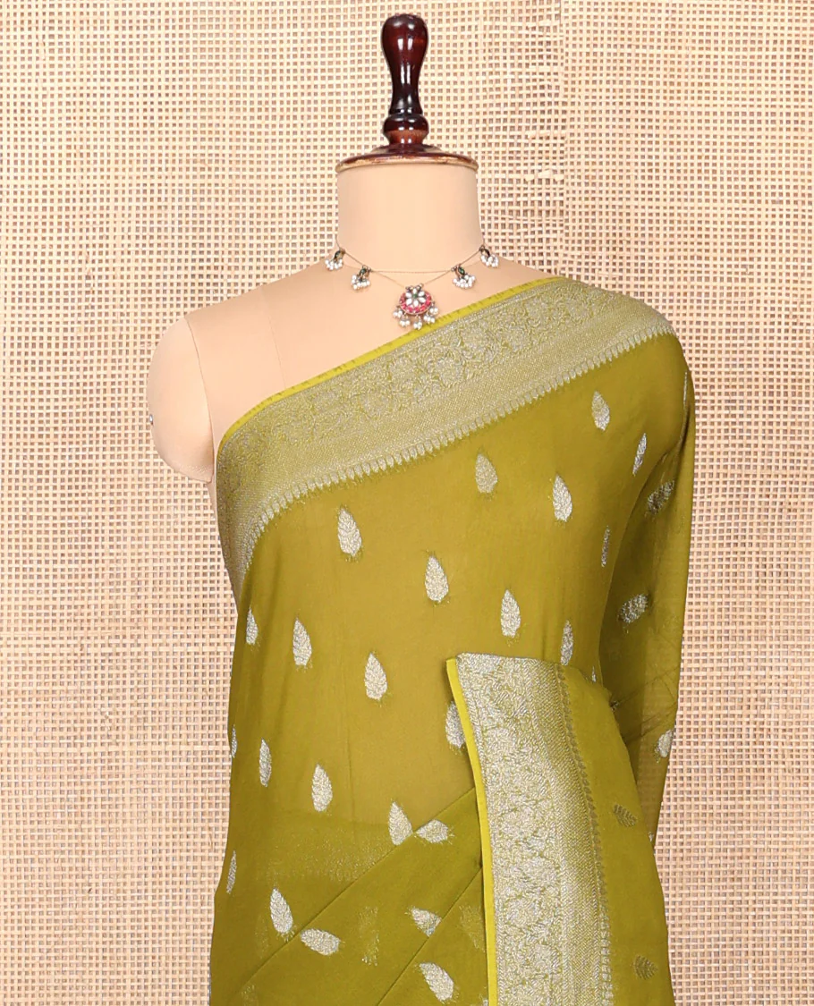 Green Georgette Saree, Steeped with Buttas, Highlighted by a Traditional Floral Creeper Border, Intricately Designed Pallu, and  a Matching Blouse - Image 3