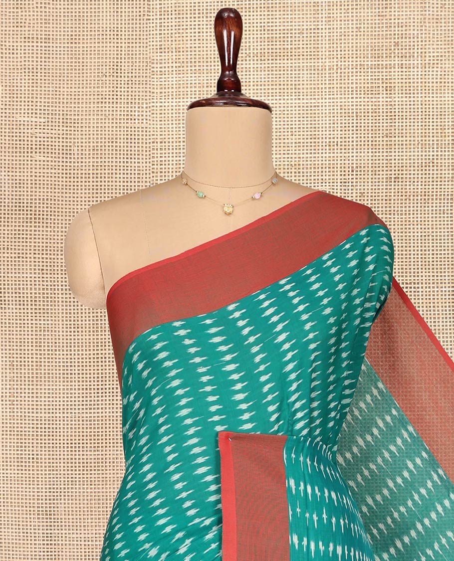 Green Ikkat Cotton Saree, Steeped with Ikkat-Style Buttas on Its Body, Complemented by a Contrast Border, Pallu Steeped with Ikkat-Style Buttas, and Has No Blouse - Image 2