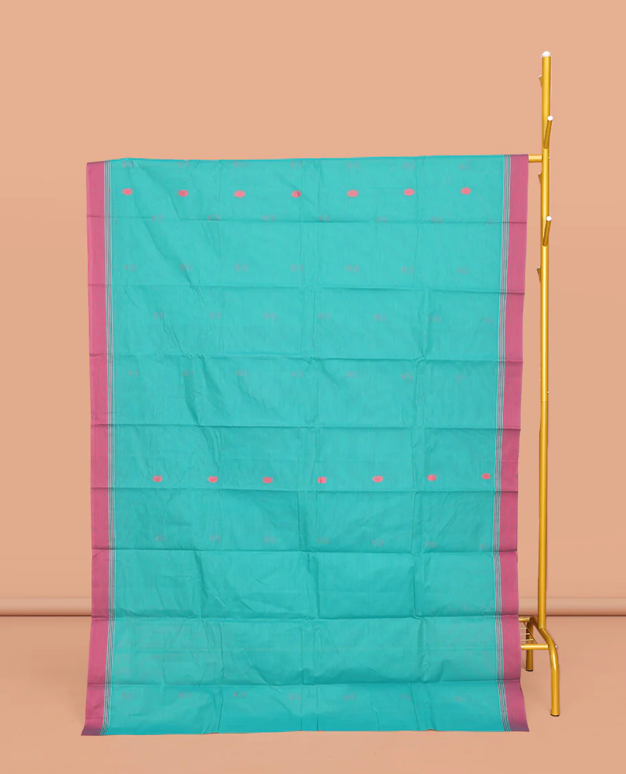 Green Kanchi Cotton Saree, Features Buttas All Over Its Body, Complemented by a Contrast Border, Pallu of Intricate Designs, and Paired with a Matching Blouse