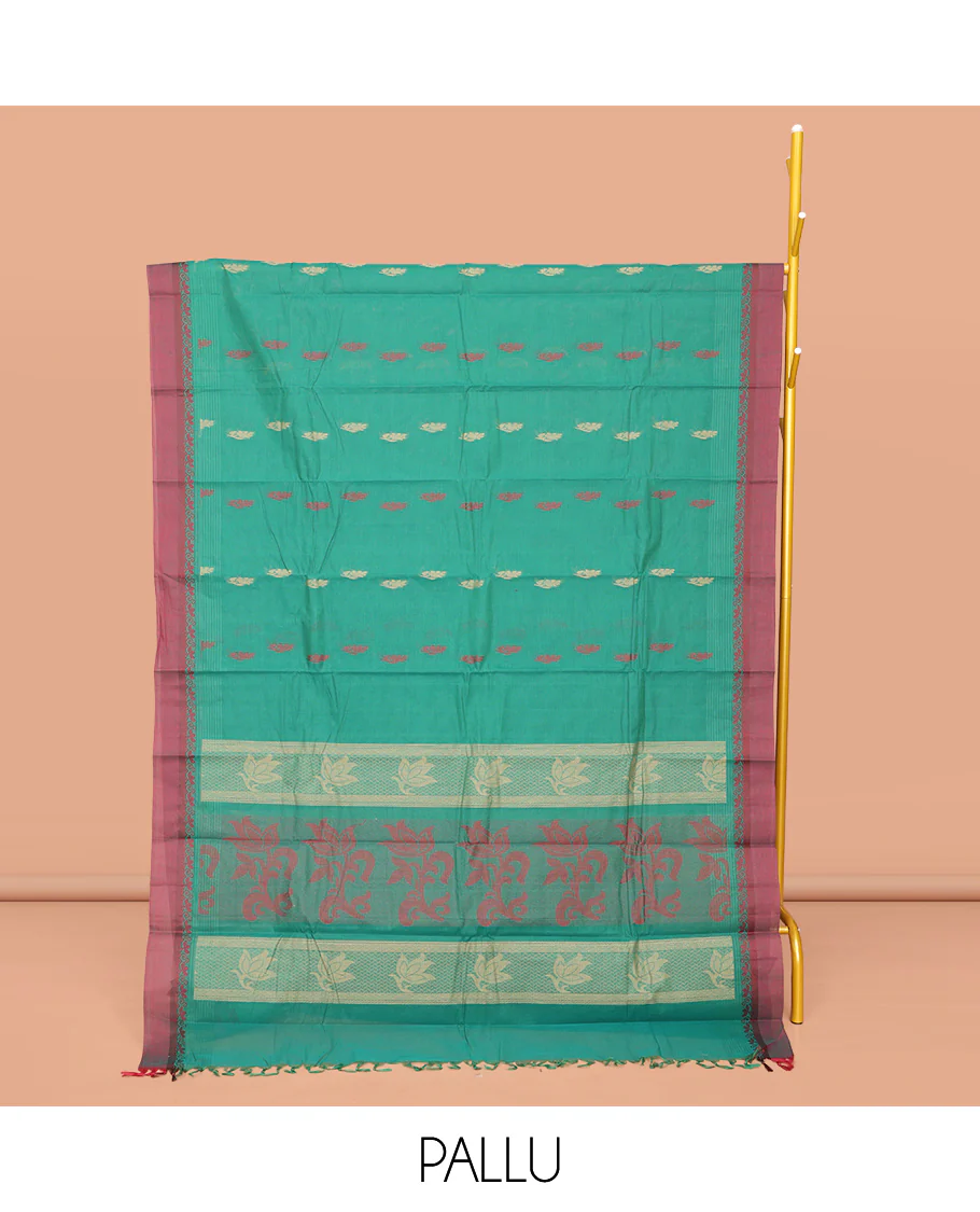 Green Kanchi Cotton Saree, Finely Crafted with Buttas All Over Its Body, Complemented by Contrast Border, Pallu of Floral Designs, and Paired with a Matching Blouse - Image 2