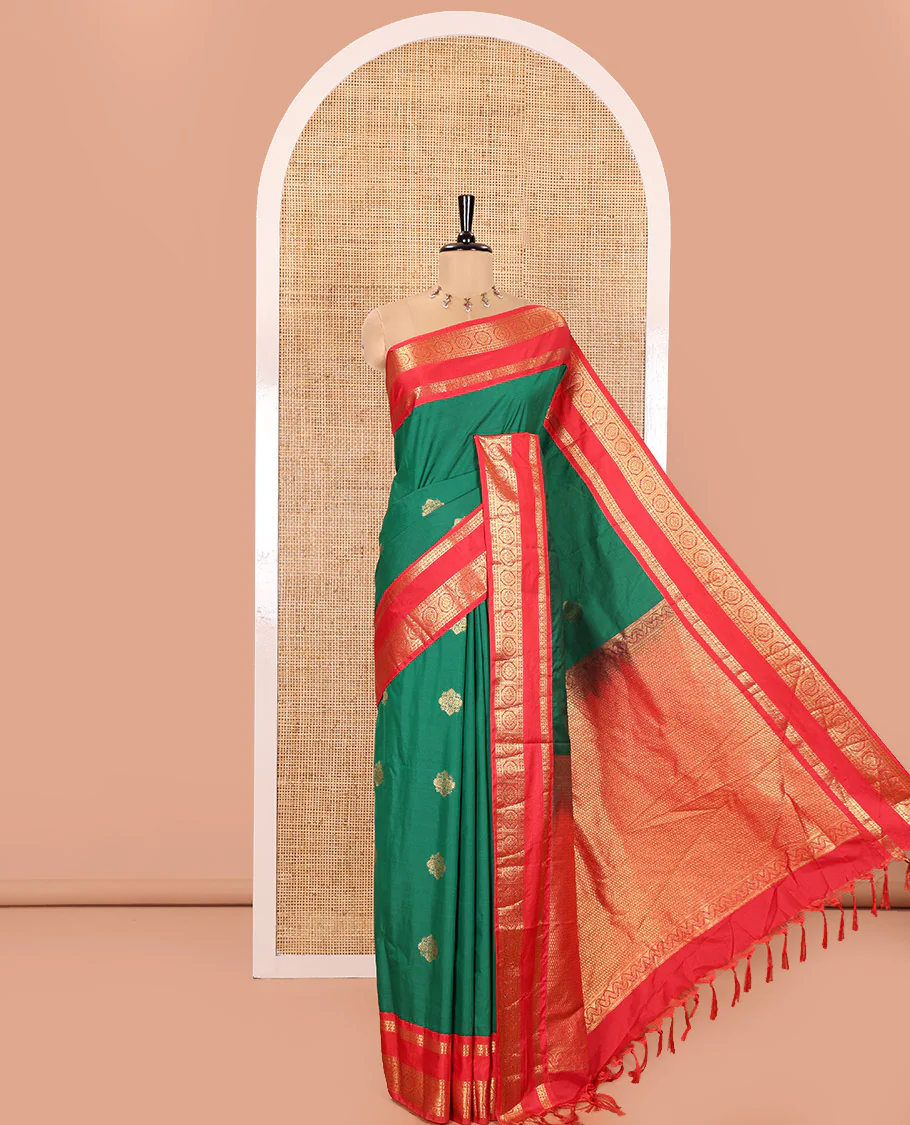 Green Kanchipuram Budget Silk Saree, Detailed with Zari Buttas All Over Its Body, Complemented by a Contrast Traditional Zari Rettai Pettu Border of Chakram Designs, Gracefully Embellished Pallu, and Paired with a Contrast Blouse - Image 5