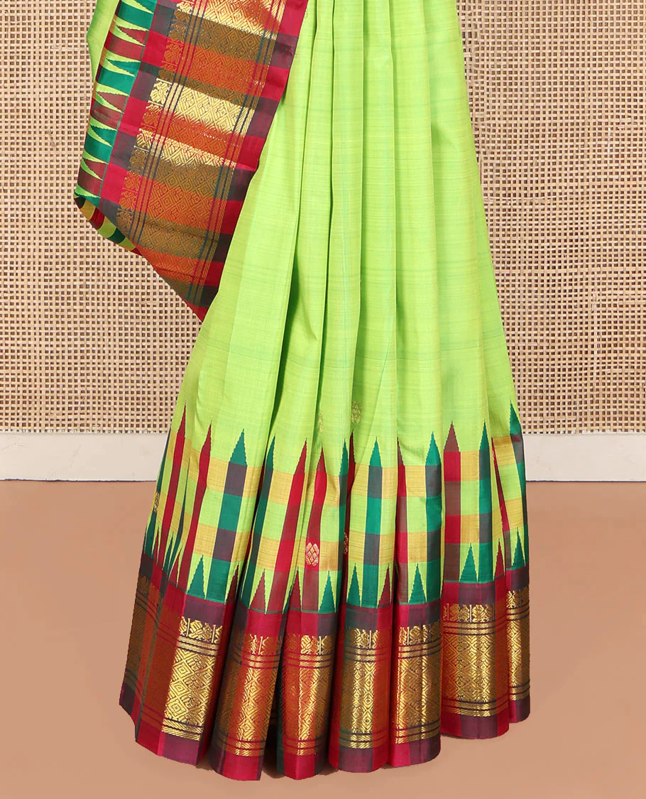 Green Kanchipuram Silk Saree, Delicately Woven with Zari Buttas on Its Body, Complemented by a Contrast One-Sided Thazampoo Rekku Border of Mayil and Jaal Designs, Pallu Depicts Zari Designs, and Comes Without a Blouse - Image 4