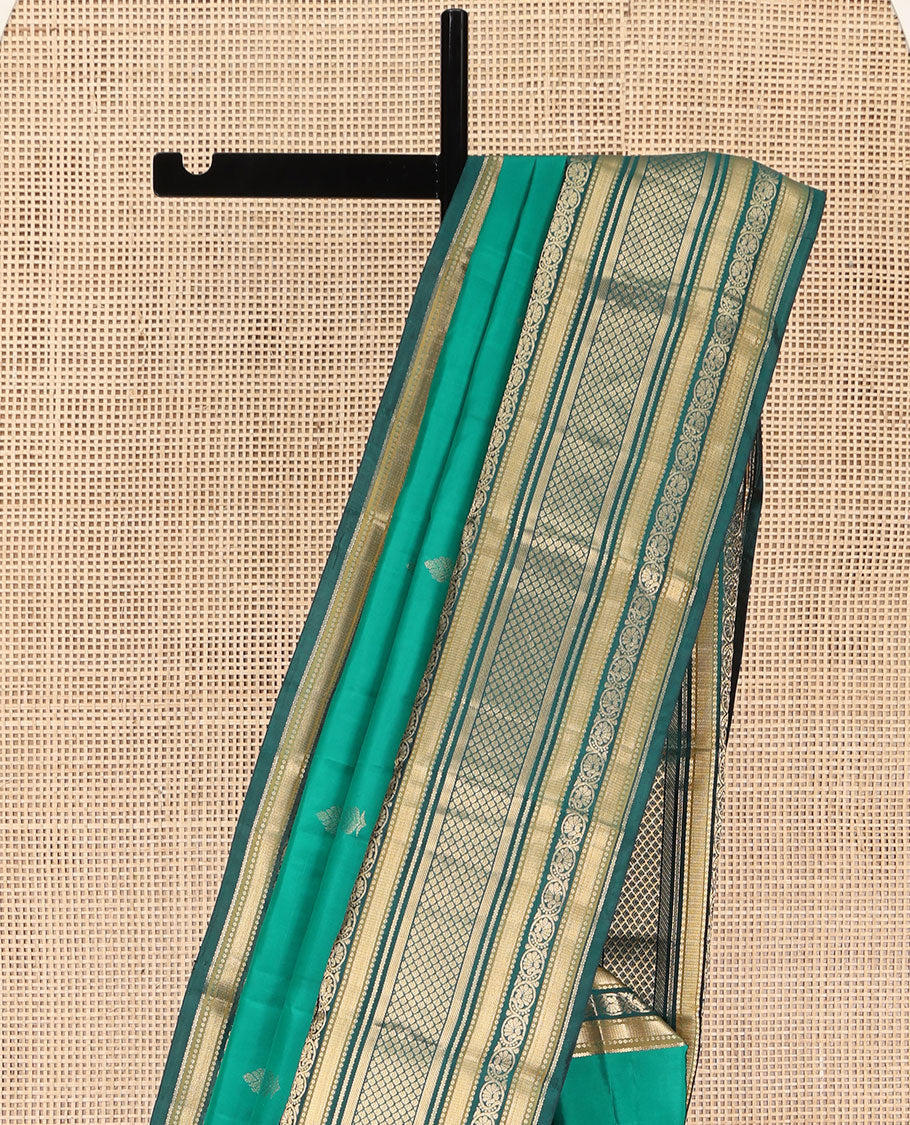 Green Kanchipuram Silk Saree, Detailed with Buttas on Its Body, Complemented by a Contrast Border of Vanki, Kodi Visiry, Neli, Banaras, and Jaal Designs, Grandly Jaal Woven Pallu, and Paired with a Contrast Blouse - Image 3