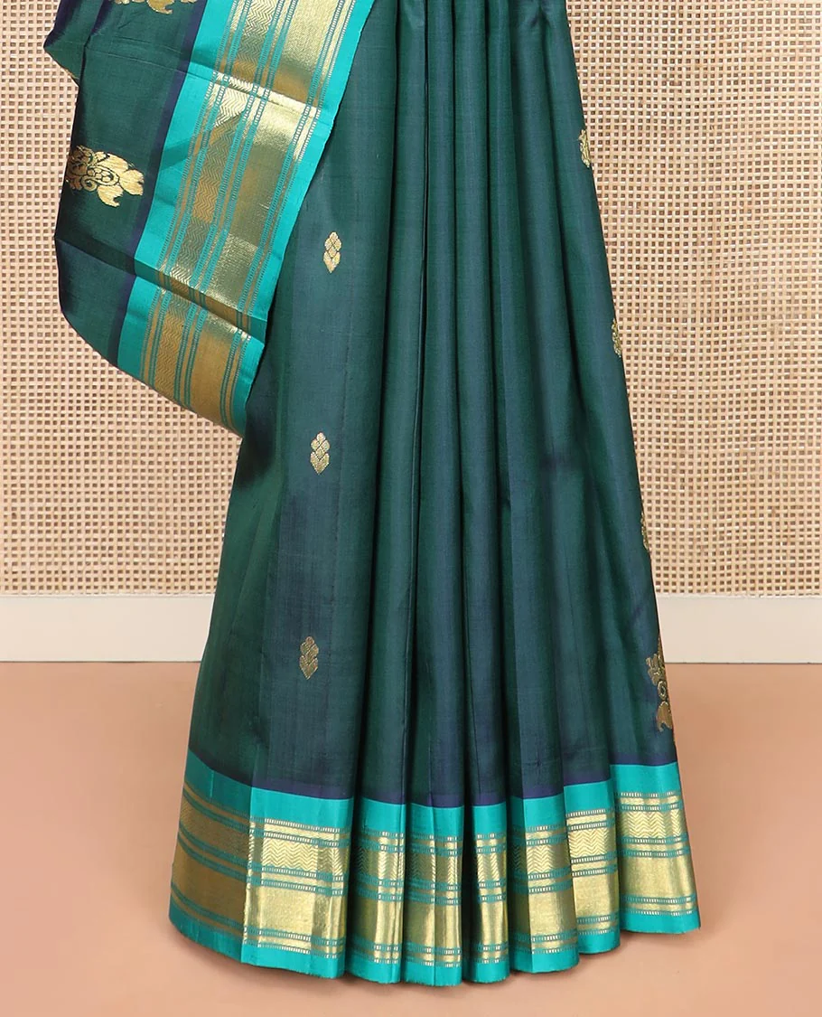 Green Kanchipuram Silk Saree, Finely Woven with Zari Buttas All Over Its Body, Complemented by Contrast One-sided Border Featuring Muthu, Kathir, and Vanki Designs, Zari Elevated Pallu of Jaal Designs, and Comes Without a Blouse - Image 4