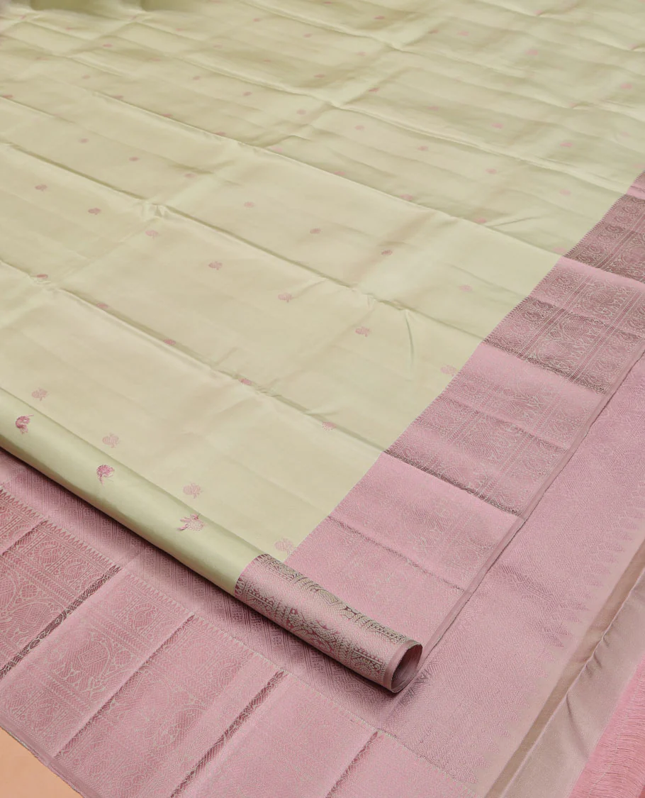Green Kanchipuram Silk Saree, Subtly Enriched with Mayil-Chakram Buttas All Over Its Body, Complemented by a Contrast Border of Thilakam, Banaras, Mayil, Kathir, and Yaanai Designs, Pallu Steeped with Kamalam Designs, and Paired with a Contrast Blouse - Image 2