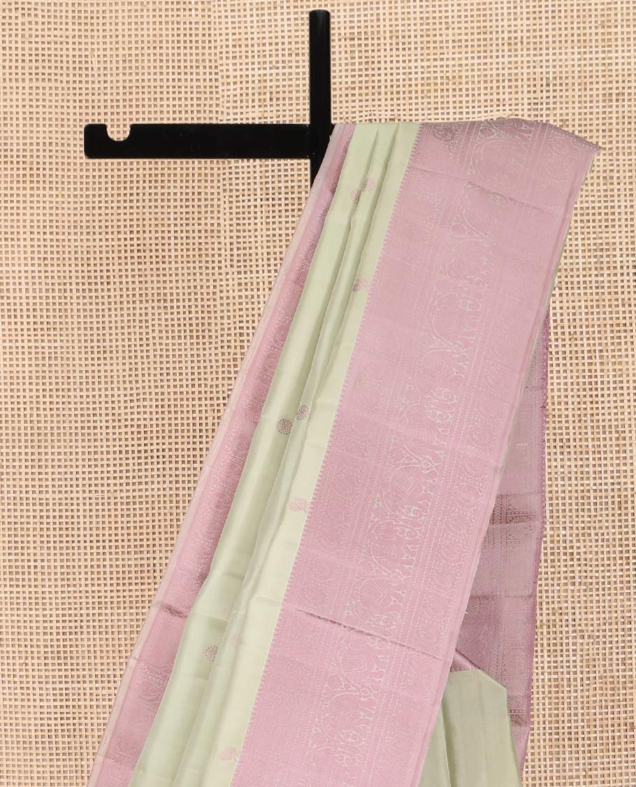 Green Kanchipuram Silk Saree, Subtly Enriched with Mayil-Chakram Buttas All Over Its Body, Complemented by a Contrast Border of Thilakam, Banaras, Mayil, Kathir, and Yaanai Designs, Pallu Steeped with Kamalam Designs, and Paired with a Contrast Blouse - Image 3
