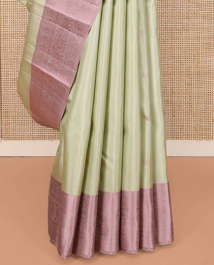 Green Kanchipuram Silk Saree, Subtly Enriched with Mayil-Chakram Buttas All Over Its Body, Complemented by a Contrast Border of Thilakam, Banaras, Mayil, Kathir, and Yaanai Designs, Pallu Steeped with Kamalam Designs, and Paired with a Contrast Blouse - Image 4