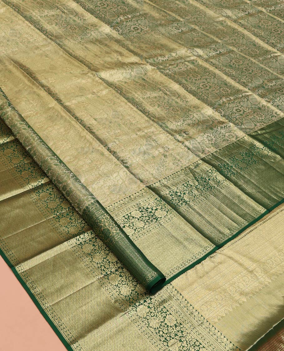 Green Kanchipuram Tissue Silk Saree, Majestically Detailed with Jacquard Designs on Its Body, Highlighted by a Zari Border of Jaal, and Floral Designs, Intricately Designed Pallu, and Paired with a Matching Blouse - Image 2
