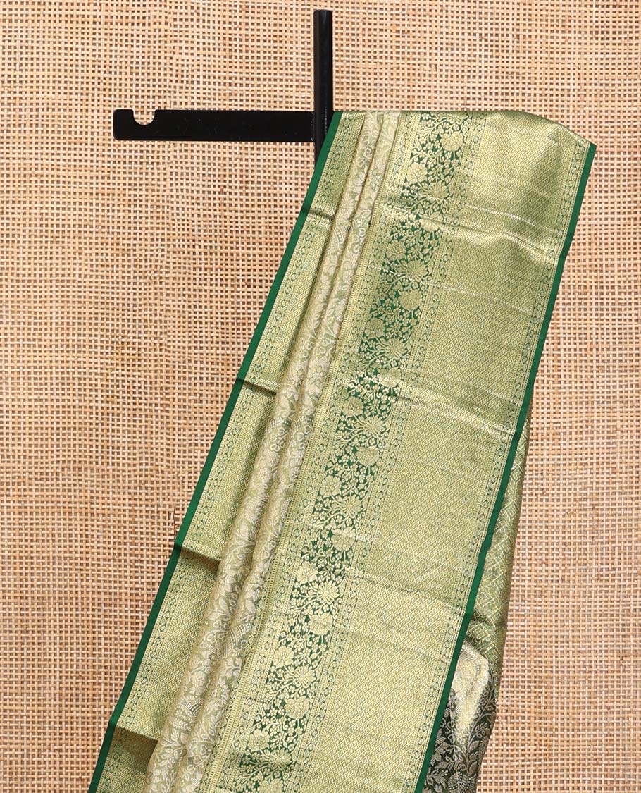 Green Kanchipuram Tissue Silk Saree, Majestically Detailed with Jacquard Designs on Its Body, Highlighted by a Zari Border of Jaal, and Floral Designs, Intricately Designed Pallu, and Paired with a Matching Blouse - Image 3