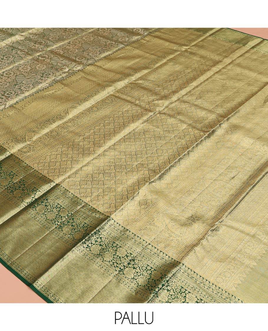 Green Kanchipuram Tissue Silk Saree, Majestically Detailed with Jacquard Designs on Its Body, Highlighted by a Zari Border of Jaal, and Floral Designs, Intricately Designed Pallu, and Paired with a Matching Blouse - Image 5
