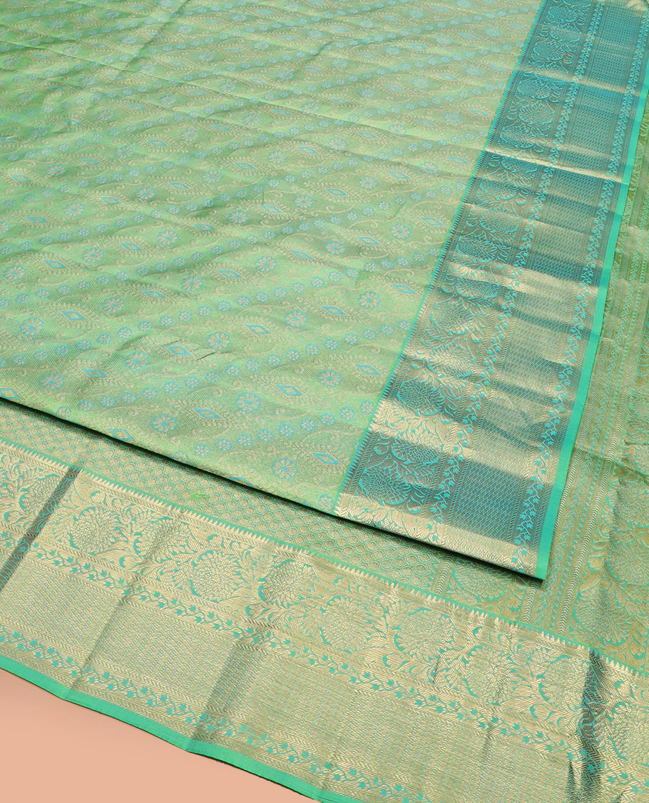 Green Kanchipuram Wedding Silk Saree Beautifully Bedecked with Meenakari Jacquard Designs, Highlighted with Contrast Border of Rekku, Kathir, and Kodi Visiry Designs, Grandly Decked Up Pallu of Jaal Designs, and Paired with a Contrast Blouse - Image 3