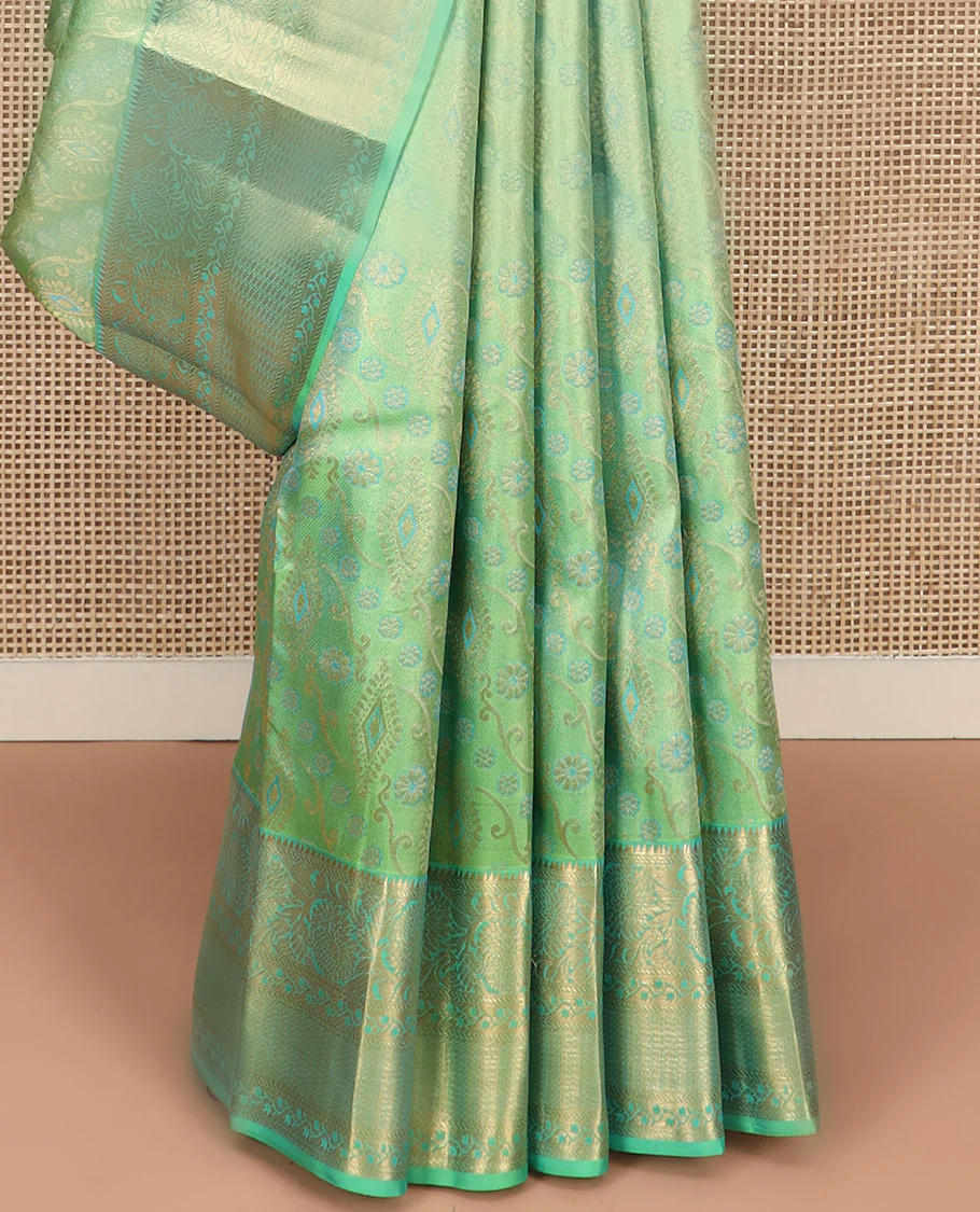 Green Kanchipuram Wedding Silk Saree Beautifully Bedecked with Meenakari Jacquard Designs, Highlighted with Contrast Border of Rekku, Kathir, and Kodi Visiry Designs, Grandly Decked Up Pallu of Jaal Designs, and Paired with a Contrast Blouse - Image 4
