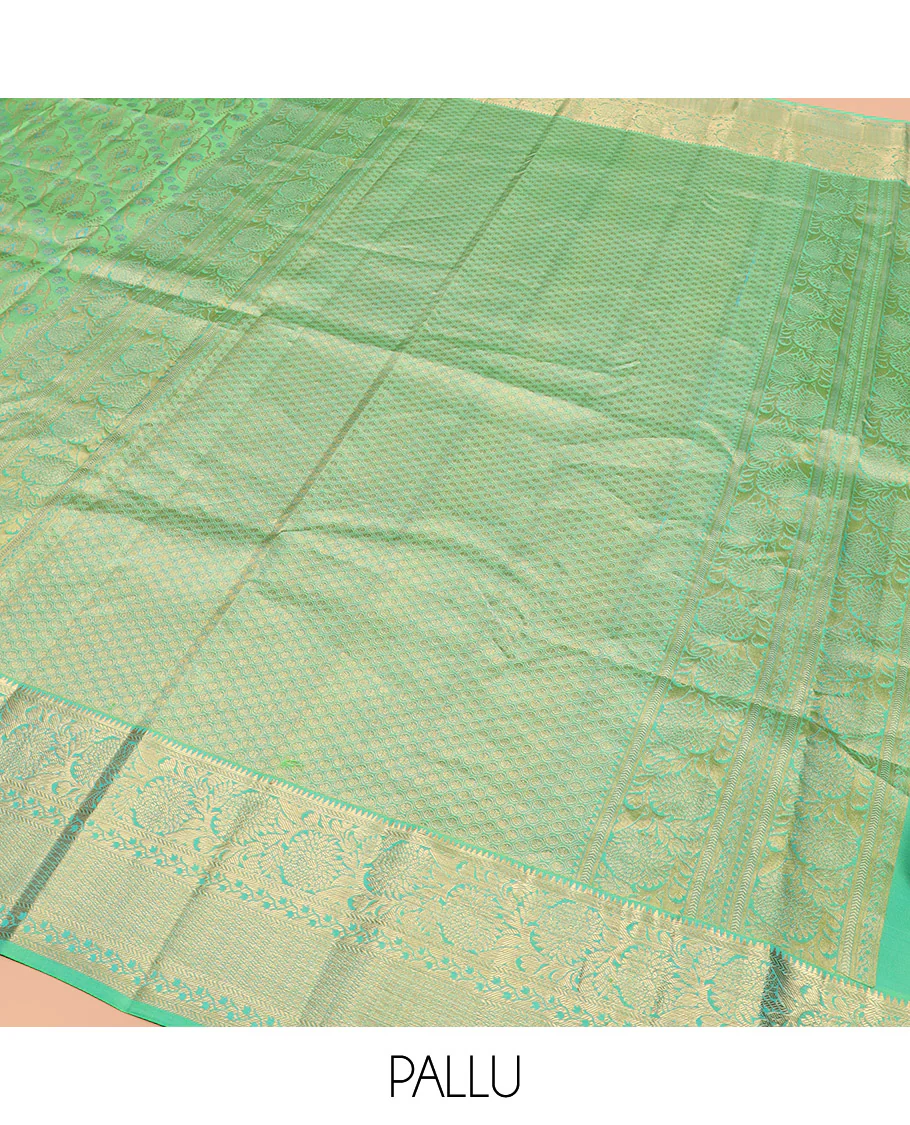 Green Kanchipuram Wedding Silk Saree Beautifully Bedecked with Meenakari Jacquard Designs, Highlighted with Contrast Border of Rekku, Kathir, and Kodi Visiry Designs, Grandly Decked Up Pallu of Jaal Designs, and Paired with a Contrast Blouse - Image 5
