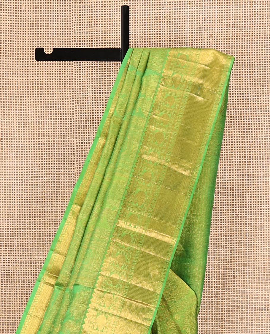 Green Kanchipuram Wedding Silk Saree, Entralled with Jacquard Design On Its Body, Highlighted by Zari Border of Rekku, Kathir, Muthu, Manga and Zari Stripes, Grand Pallu and Paired with a Matching Blouse - Image 3