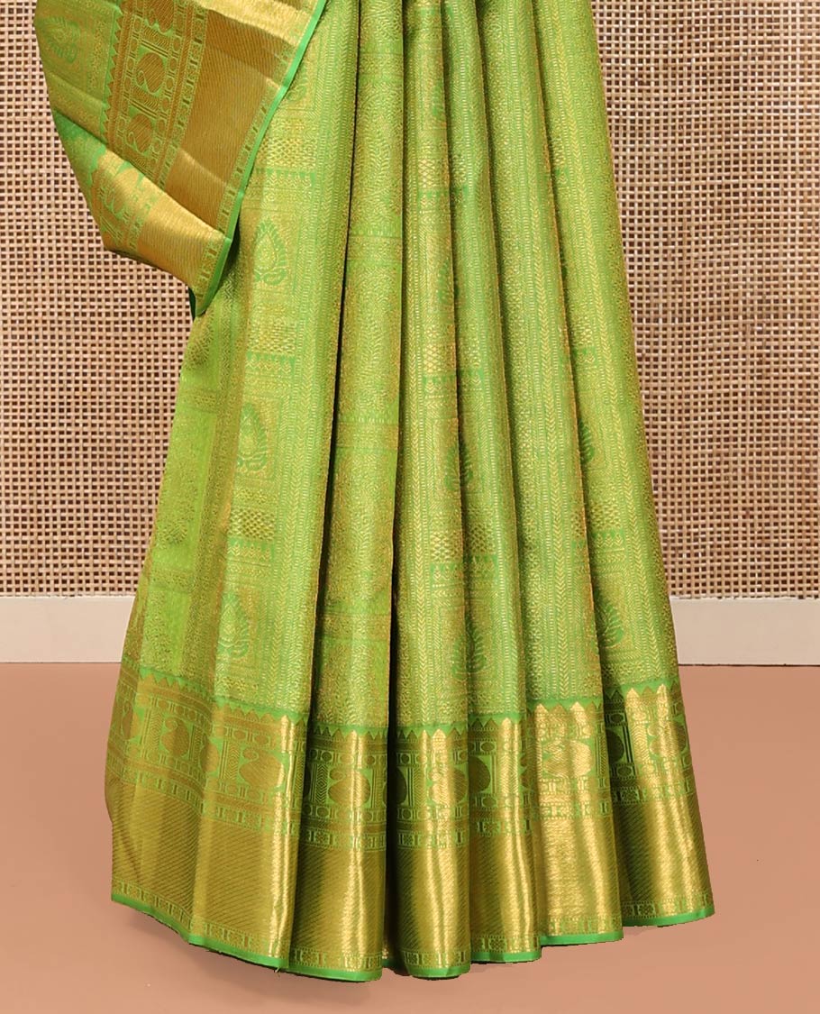 Green Kanchipuram Wedding Silk Saree, Entralled with Jacquard Design On Its Body, Highlighted by Zari Border of Rekku, Kathir, Muthu, Manga and Zari Stripes, Grand Pallu and Paired with a Matching Blouse - Image 4