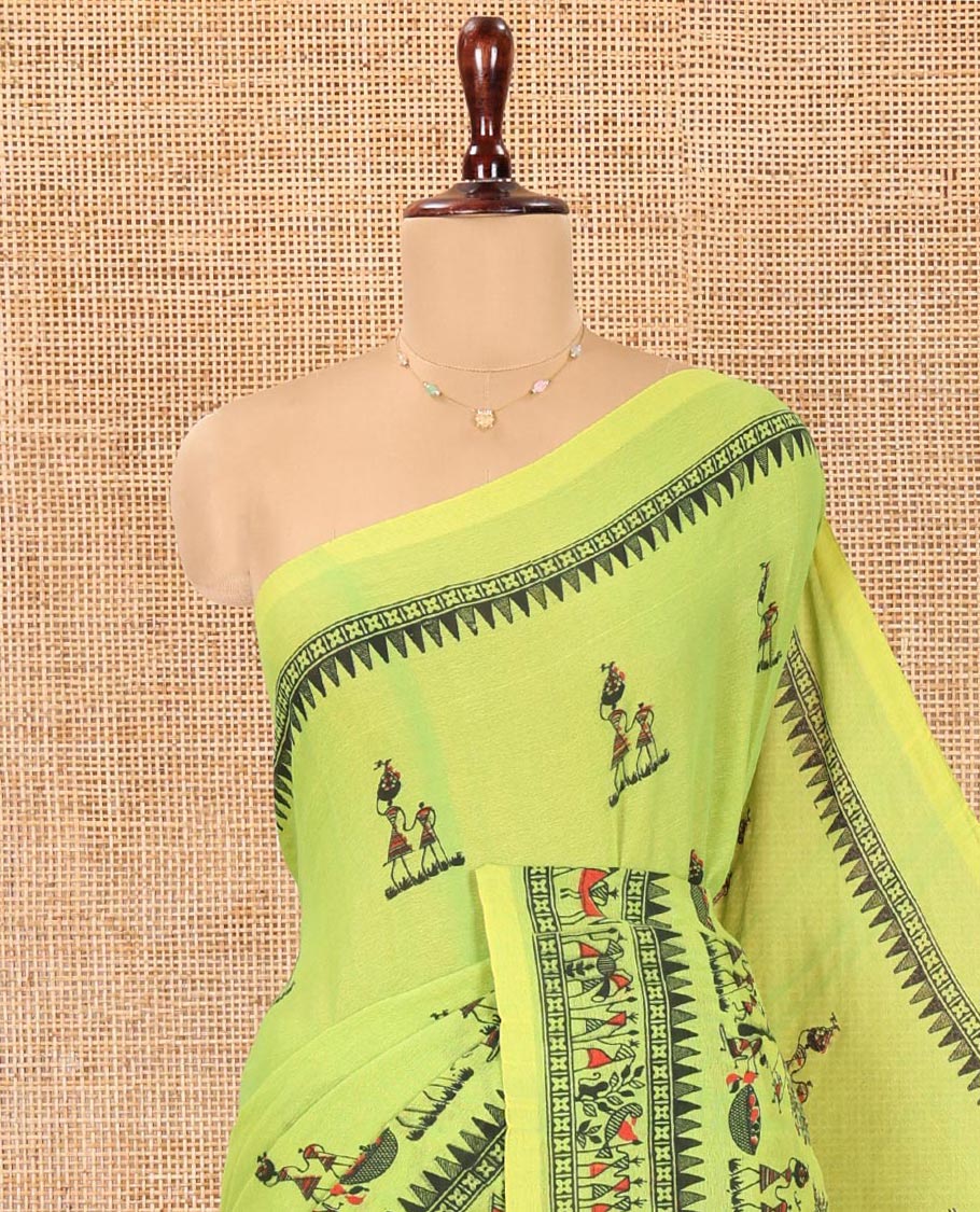 Green Khadi Mul Cotton Saree, Artfully Printed with Warli Motifs All Over Its Body, Highlighted by a Self-Border of Warli Print, Pallu of Warli Print, and Paired with a Matching Blouse - Image 2