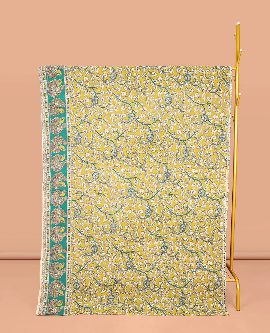 Green Machine-Printed Kalamkari Cotton Saree, Embellished with Floral Vine on Its Body, Complemented by a Contrast Border of Peacock Print, Pallu of Floral-Geometric Print, and Paired with a Matching Blouse
