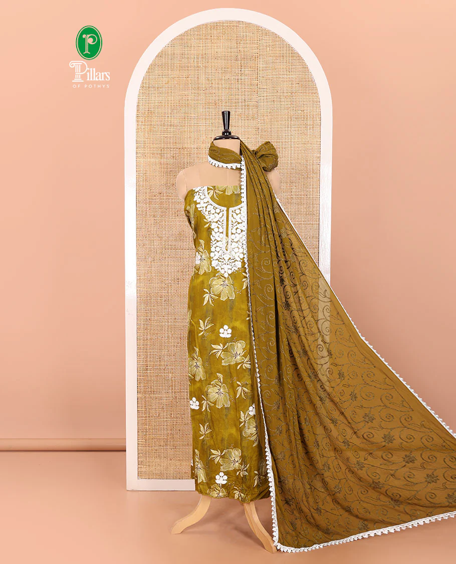 Green Material Chudidar Set Embellished with Phulkari-Style Floral Embroidery and Floral Print Rayon Top, Subtly Made Plain Rayon Bottom, and a Chiffon Georgette Dupatta of Floral Theme Designs