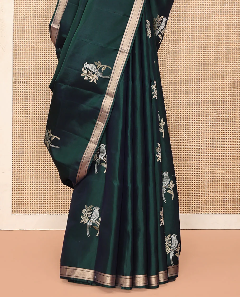 Green Mayuri Soft Silk Saree, Bedecked with Bird Buttas All Over Its Body, Highlighted by Zari Piping Border, Pallu of Floral Jaal and Bird Designs, and Paired with a Matching Blouse - Image 4
