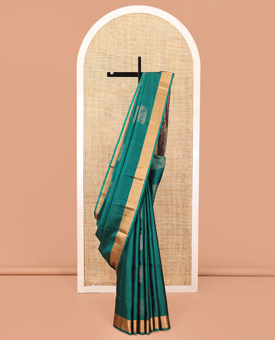Green Mayuri Soft Silk Saree, Embellished with Buttas All Over the Body, Highlighted by a Zari  Bavanji Border, Contrast Intricately Designed Pallu, and Paired with a Contrast Blouse