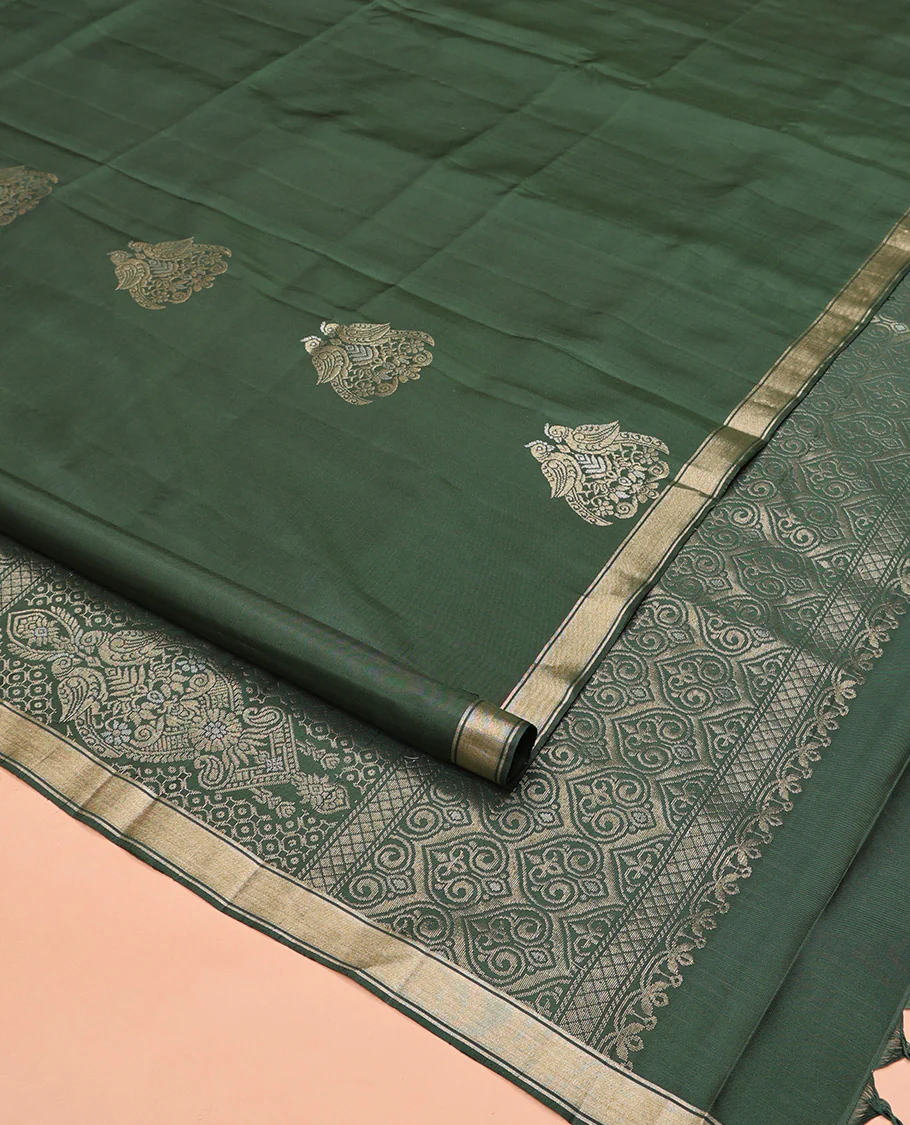 Green Mayuri Soft Silk Saree, Entralled with Zari Buttas All Over Its Body Highlighted iby Zari Piping Border, Intricately Designed Pallu and Paired with a Matching Blouse - Image 2