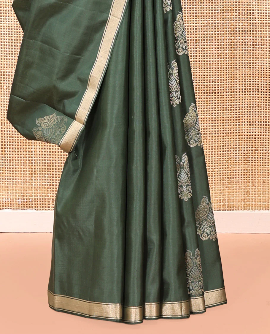 Green Mayuri Soft Silk Saree, Entralled with Zari Buttas All Over Its Body Highlighted iby Zari Piping Border, Intricately Designed Pallu and Paired with a Matching Blouse - Image 4